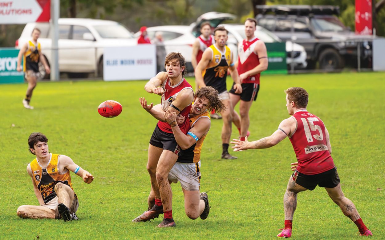 Mud fight: Frankston YCW clinched a win over Red Hill. Picture: Craig Barrett