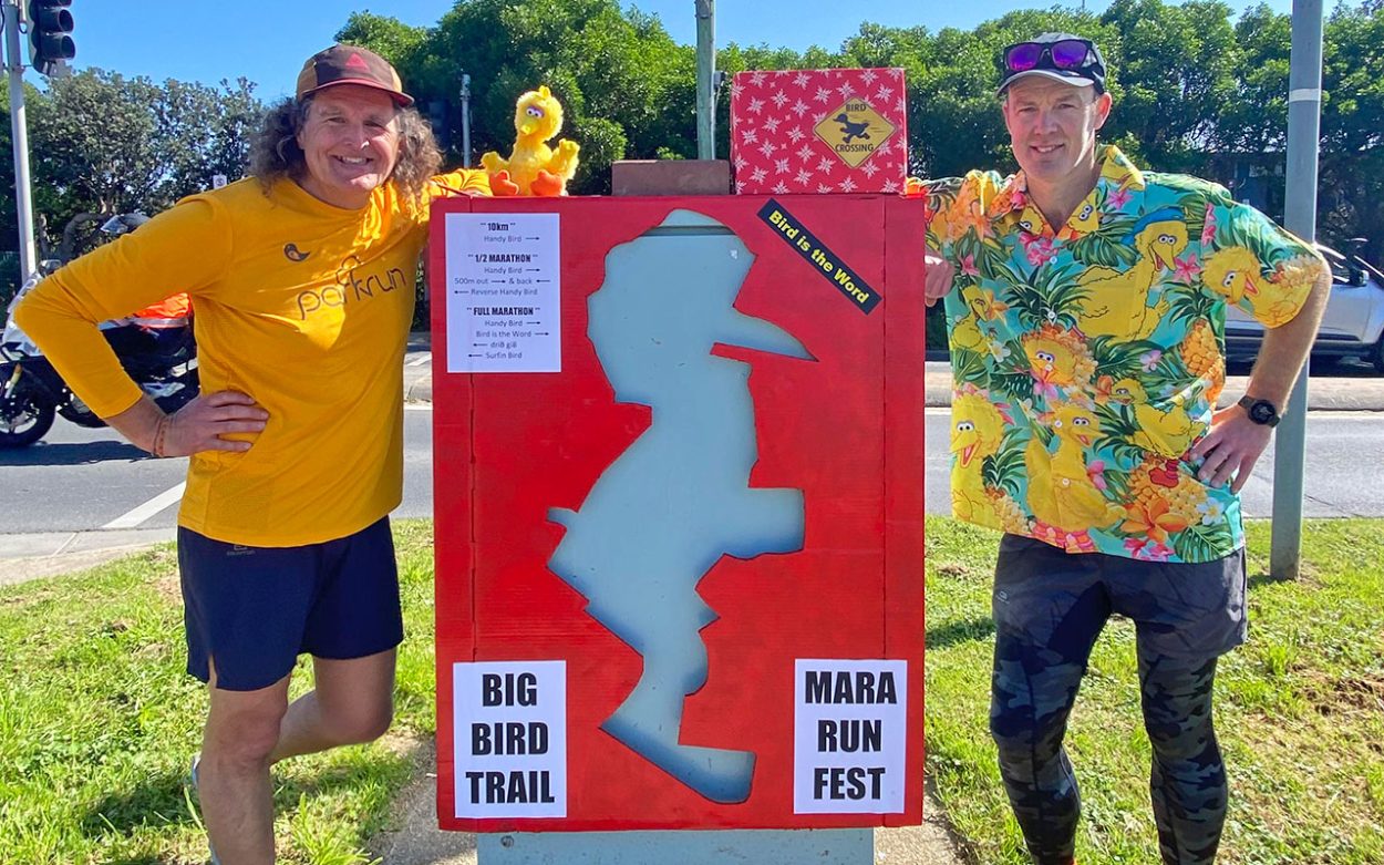 A CARDBOARD Big Bird sign flanked by Peter Mitchell, right, and his “right hand man” Mick Duyvestyn.