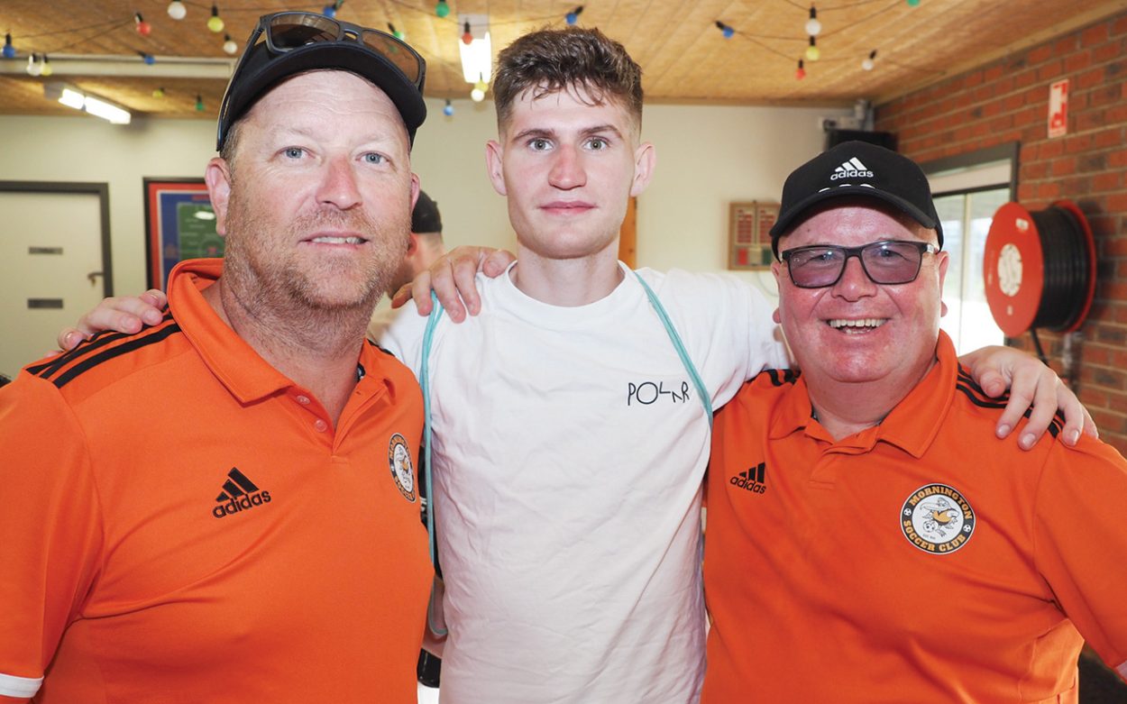 Seagulls trio: Mornington head coach Adam Jamieson (left) and team manager David Waring (right) pictured with star Scottish striker Rory Currie last year. Picture: Darryl Kennedy