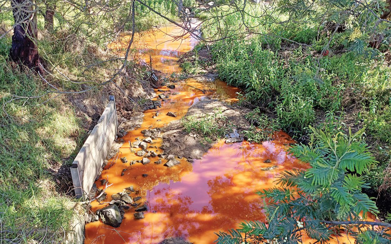 THE discoloured water at the Harrap Road crossing. Picture: Supplied