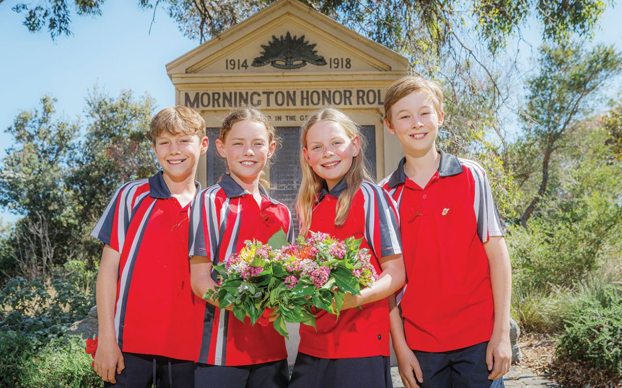 PHILIP (P.J.), Jess, Heidi and Connor from Mount Martha Primary School lay a wreath at the Mornington Memorial Park. Picture: Gary Sissons