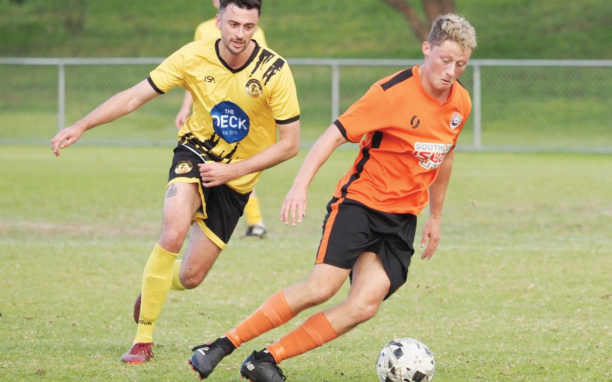 Bye, bye Bruce: Aspendale star Matthew Bruce (right) pursued by Seaford United’s Michael Nobbs. Picture: Darryl Kennedy